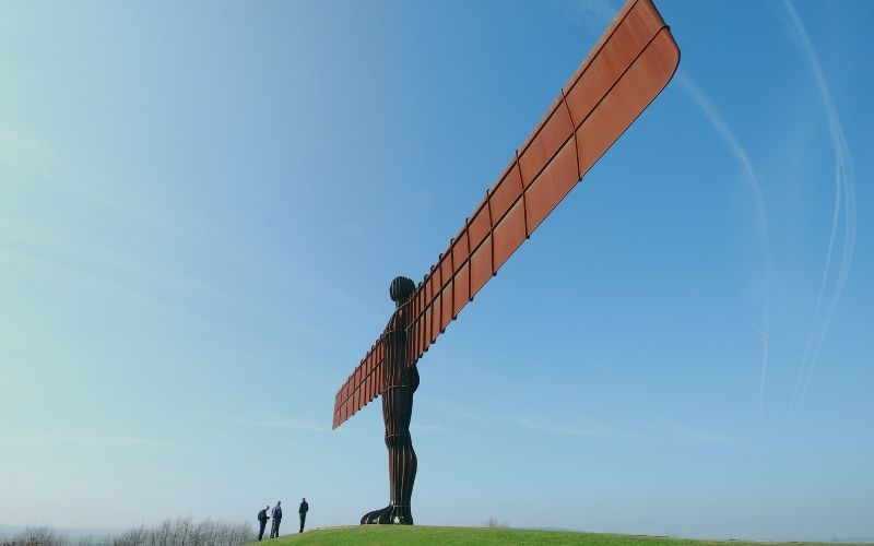 The Angel of the North sculpture in Gateshead against a blue sky
