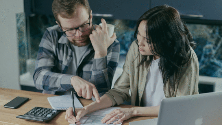 Couple reviewing broadband exit fees and early termination charges